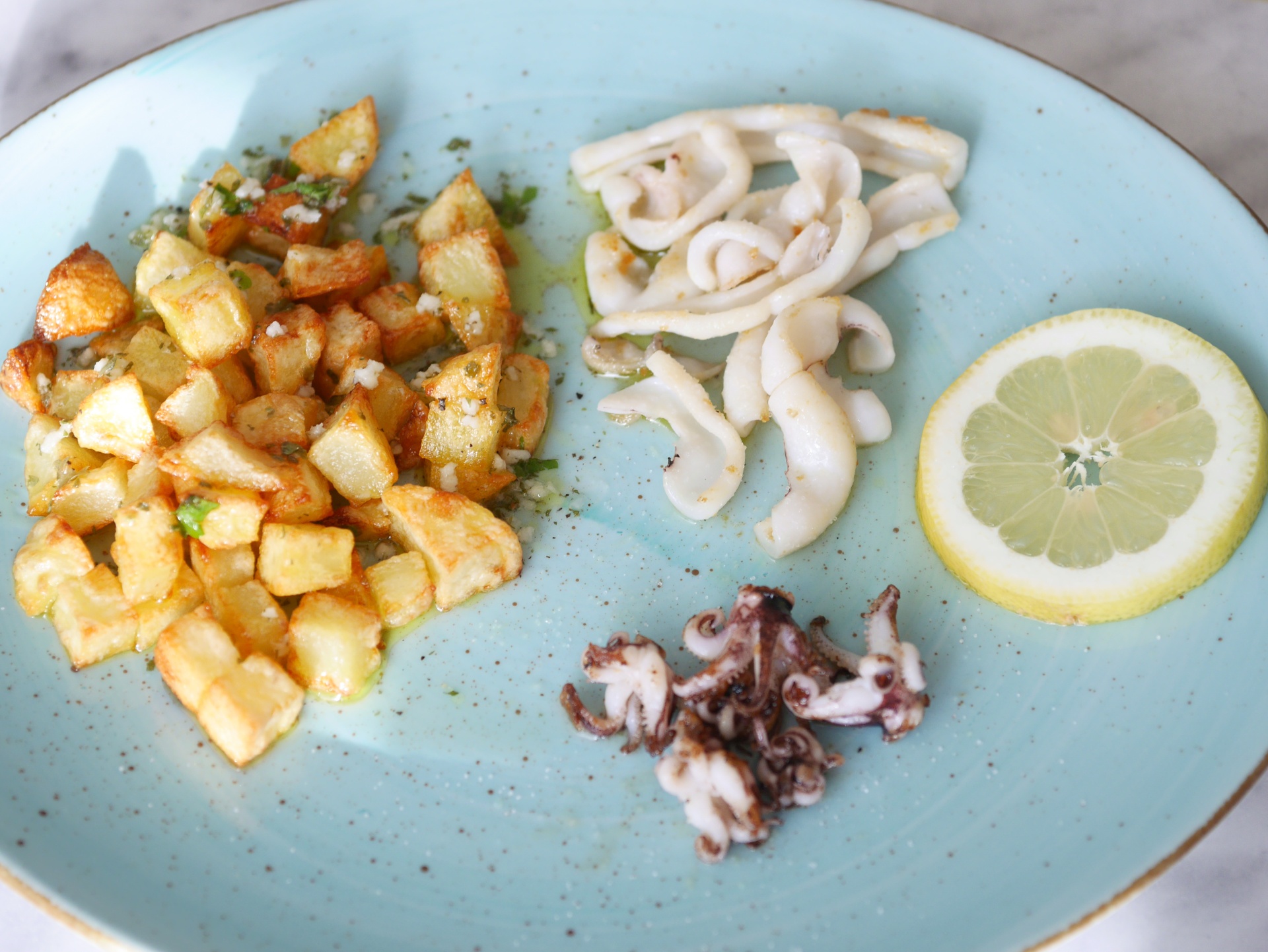 Tintenfisch mit griechischen
              Zitronenkartoffeln